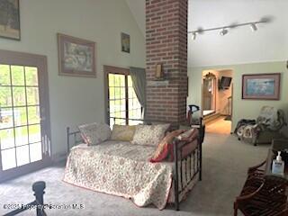 1087 Canada Road Friendsville, PA 18818 - Photo 16 of 72 a bedroom with a bed and wooden floor