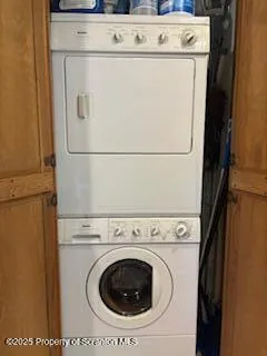 a bedroom with a bed and a mirror