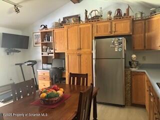 1087 Canada Road Friendsville, PA 18818 - Photo 30 of 72 a kitchen with stainless steel appliances granite countertop a refrigerator a stove and a sink