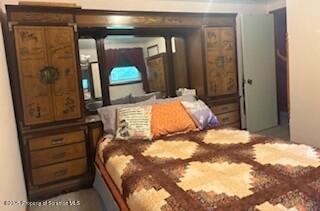 1087 Canada Road Friendsville, PA 18818 - Photo 37 of 72 a bedroom with a bed and a mirror