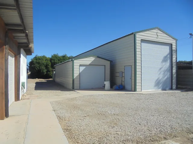 a front view of a house with a garage