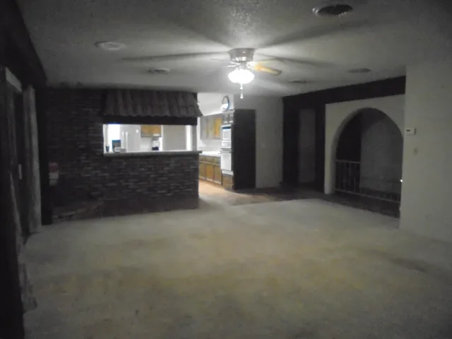 a bedroom with a bed and dresser