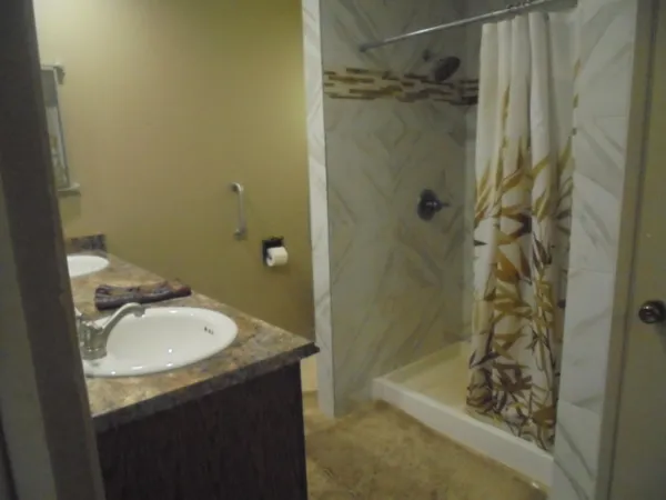 a bathroom with a sink and a mirror