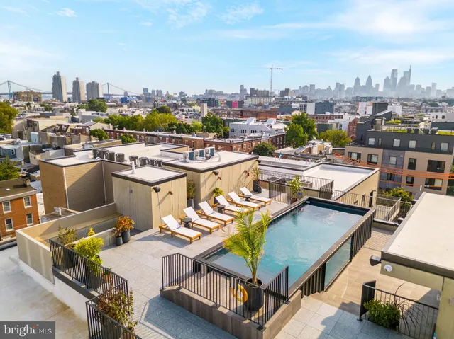 a view of a terrace with sitting area