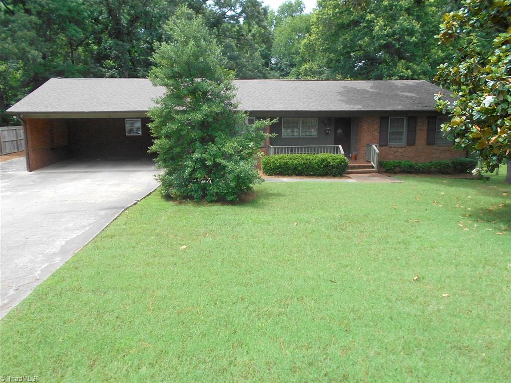 513 Shadybrook Road High Point, NC 27265 - Photo 3 of 25 Attached carport & paved drive