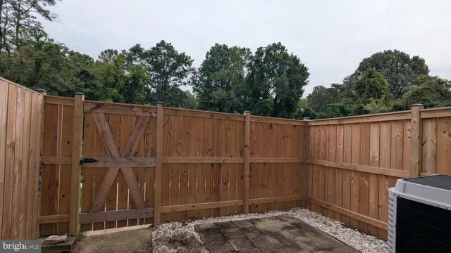 a view of a wooden fence
