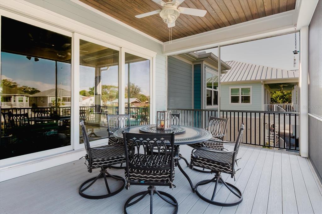 216 High Street Tarpon Springs, FL 34689 - Photo 30 of 75 a dining room with furniture and wooden floor