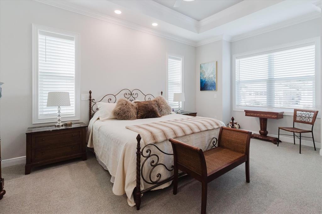 216 High Street Tarpon Springs, FL 34689 - Photo 32 of 75 a bedroom with a bed and a window