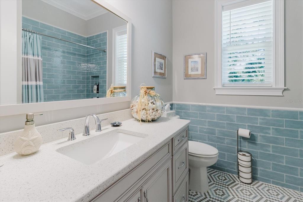 216 High Street Tarpon Springs, FL 34689 - Photo 40 of 75 a bathroom with a sink and a toilet