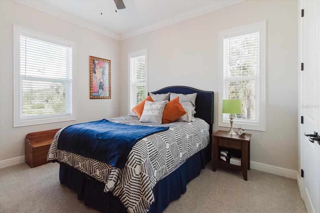 216 High Street Tarpon Springs, FL 34689 - Photo 43 of 75 a bedroom with a bed and a window