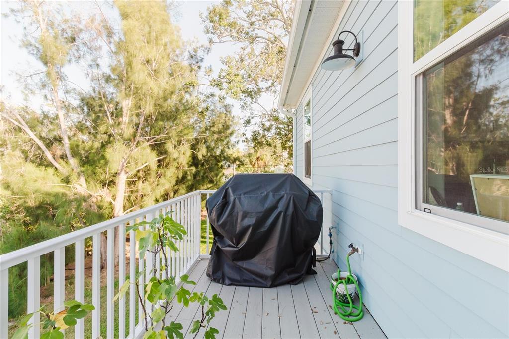 216 High Street Tarpon Springs, FL 34689 - Photo 52 of 75 a view of a small yard and wooden fence