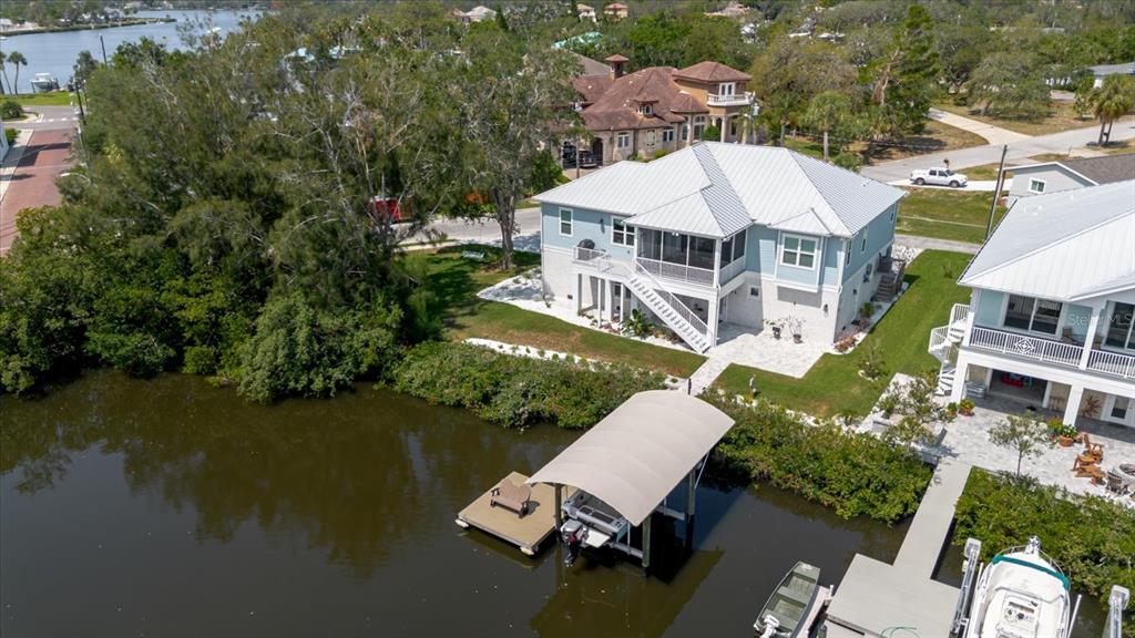216 High Street Tarpon Springs, FL 34689 - Photo 62 of 75 an aerial view of a house with outdoor space lake view and boat