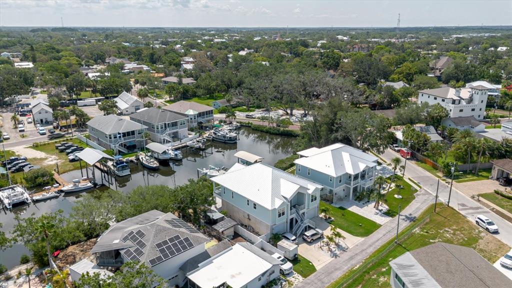 216 High Street Tarpon Springs, FL 34689 - Photo 64 of 75 an aerial view of a city with lots of residential buildings