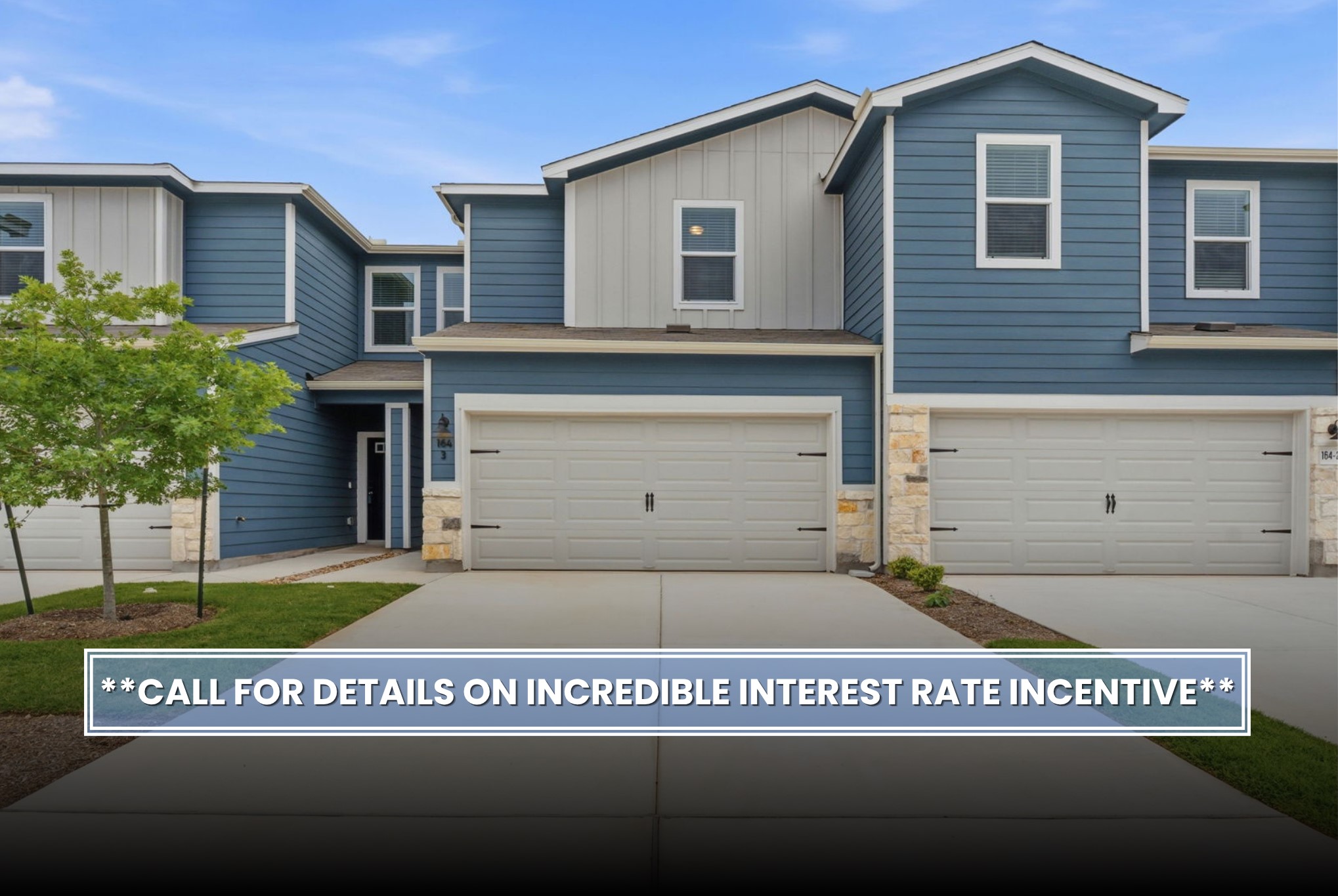 164 Cinnabar Lane, Unit 3 Kyle, TX 78640 - Photo 2 of 20 Contemporary townhome featuring blue siding, light stone accents, and a contrasting light gray facade
