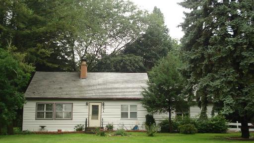 a house view with garden space