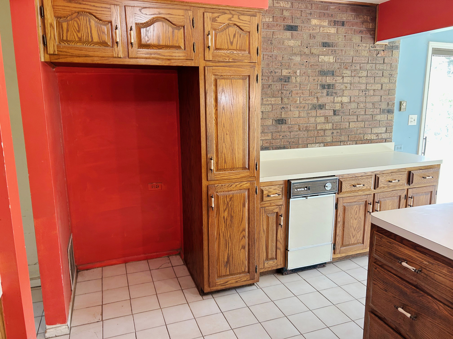 3413 East Bemes Road Crete, IL 60417 - Photo 15 of 29 a view of a kitchen with white cabinets and a stove top oven