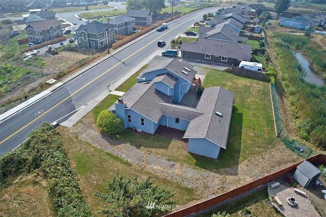 2452 Douglas Road Ferndale, WA 98248 - Photo 9 of 27 a view of a house with a backyard