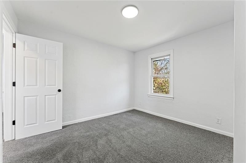 233 East 19th Avenue Homestead, PA 15120 - Photo 14 of 27 an empty room with windows