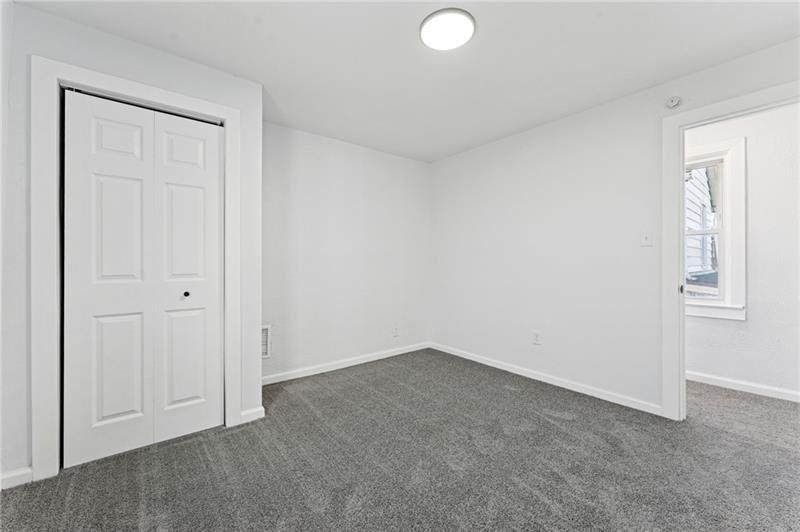 233 East 19th Avenue Homestead, PA 15120 - Photo 15 of 27 an empty room with windows