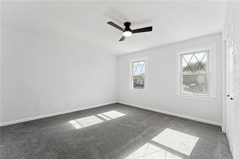 233 East 19th Avenue Homestead, PA 15120 - Photo 25 of 27 an empty room with windows