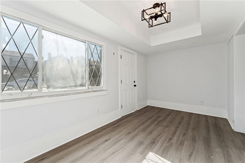 233 East 19th Avenue Homestead, PA 15120 - Photo 5 of 27 an empty room with a window