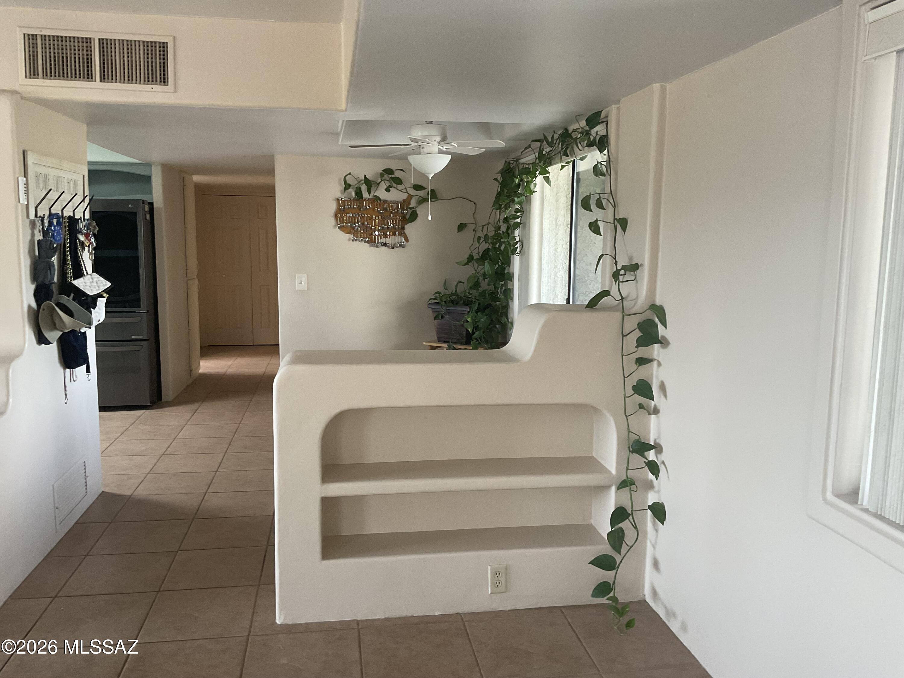 4060 North Swan Road Tucson, AZ 85718 - Photo 31 of 47 a view of staircase with white walls