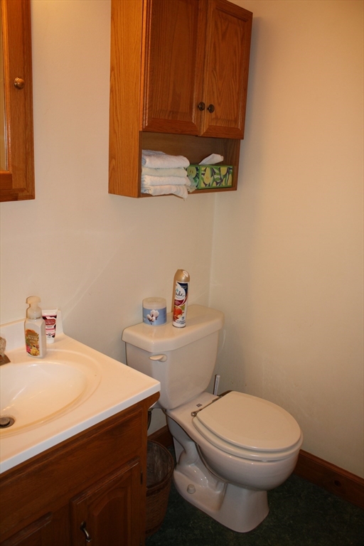 200 Peru Road Windsor, MA 01270 - Photo 11 of 42 a bathroom with a sink a toilet and vanity