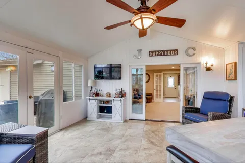 a view of a livingroom with furniture and cabinet