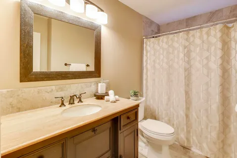 a storage room with window and washer