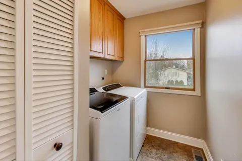 a view of a deck with couches table and chairs