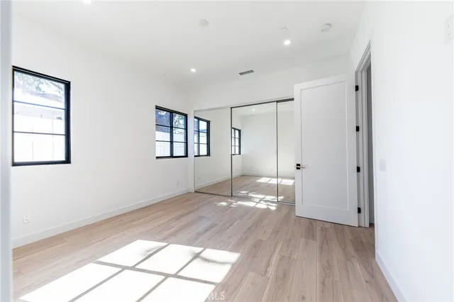 a close view of a sink a faucet and appliance in the kitchen