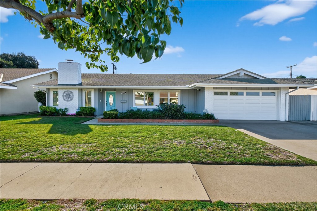 1610 East 20th Street Santa Ana, CA 92705 - Photo 40 of 43 a front view of a house with a yard