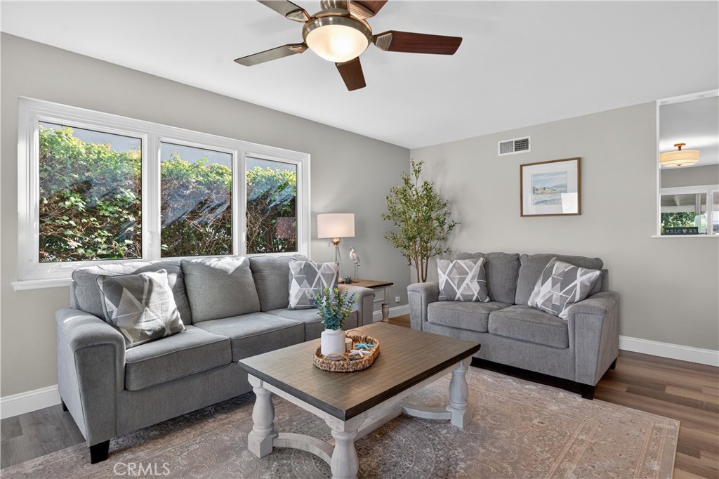 1610 East 20th Street Santa Ana, CA 92705 - Photo 6 of 43 a living room with furniture and a large window