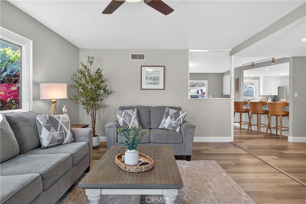 1610 East 20th Street Santa Ana, CA 92705 - Photo 7 of 43 a living room with furniture and wooden floor