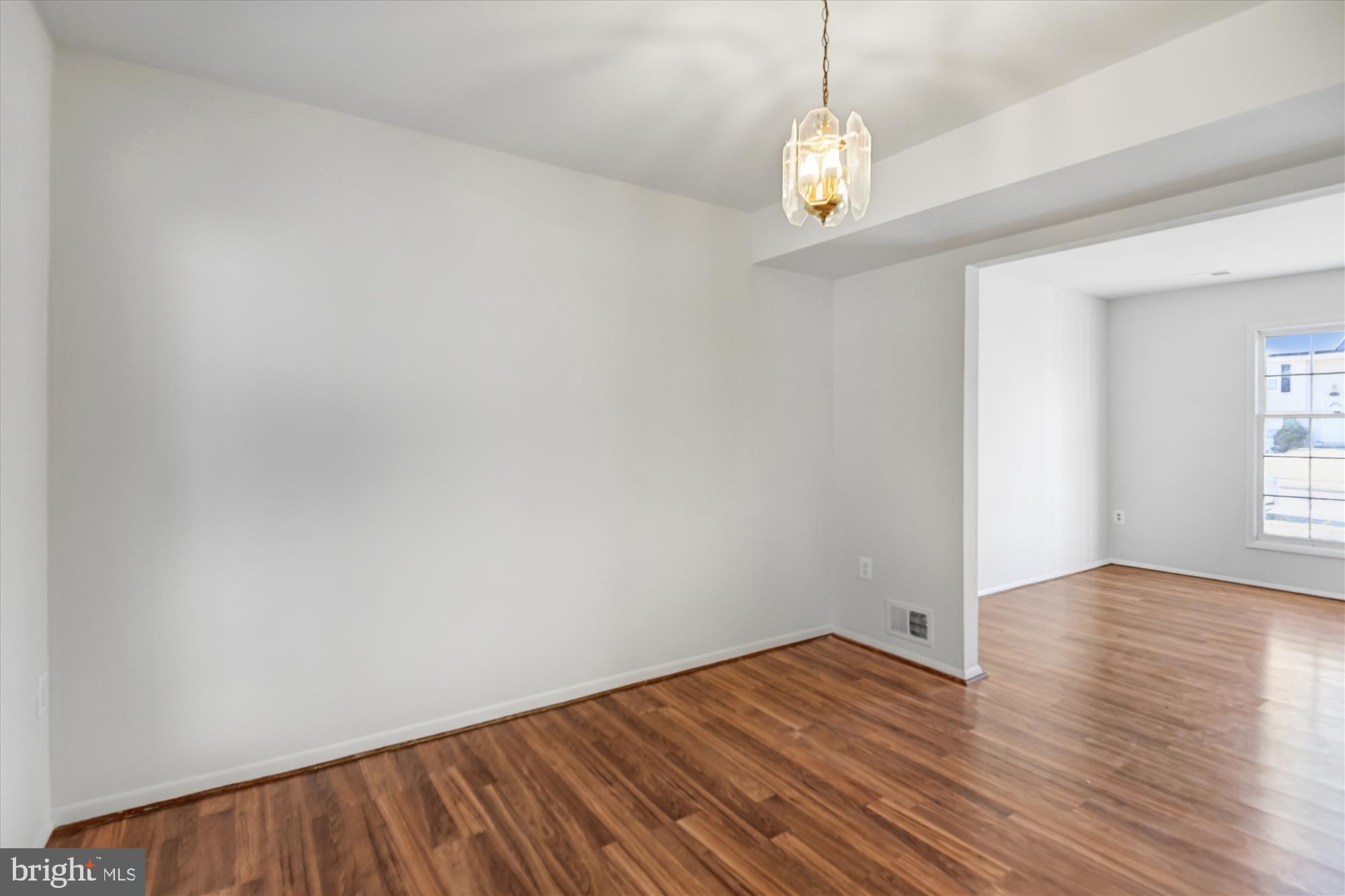 729 Chapelgate Drive Odenton, MD 21113 - Photo 26 of 64 a view of empty room with wooden floor and fan