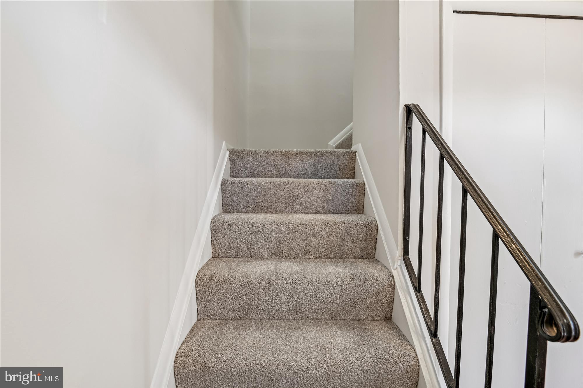 729 Chapelgate Drive Odenton, MD 21113 - Photo 42 of 64 a living room with a couch and stairs