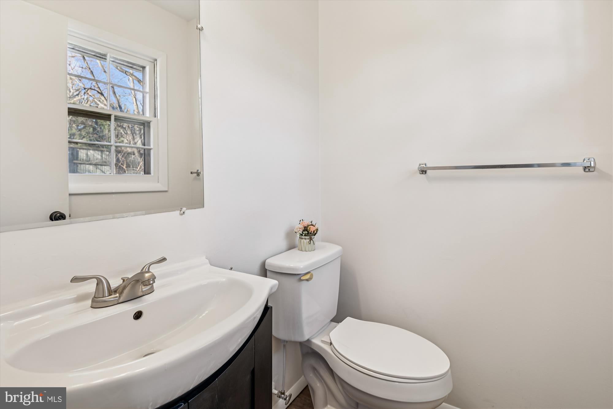 729 Chapelgate Drive Odenton, MD 21113 - Photo 47 of 64 a bathroom with a sink mirror and toilet