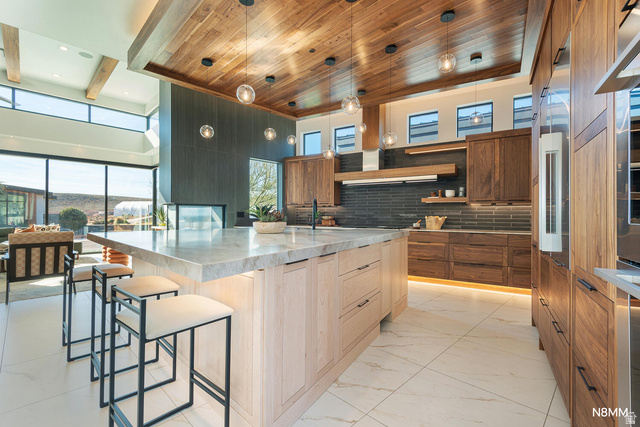 3607 South Cypress Pt Road Hurricane, UT 84737 - Photo 21 of 59 Kitchen featuring a spacious island, light stone counters, modern cabinets, and a high wood beamed ceiling