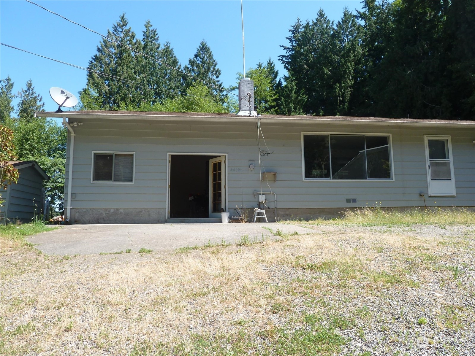 4612 Noon Road Bellingham, WA 98226 - Photo 1 of 1 a house with trees in front of it