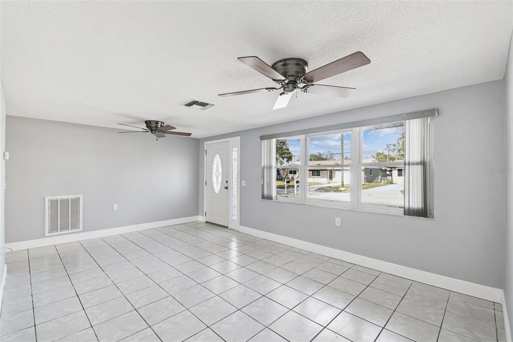 5410 Quist Drive Port Richey, FL 34668 - Photo 12 of 99 a view of an empty room and window