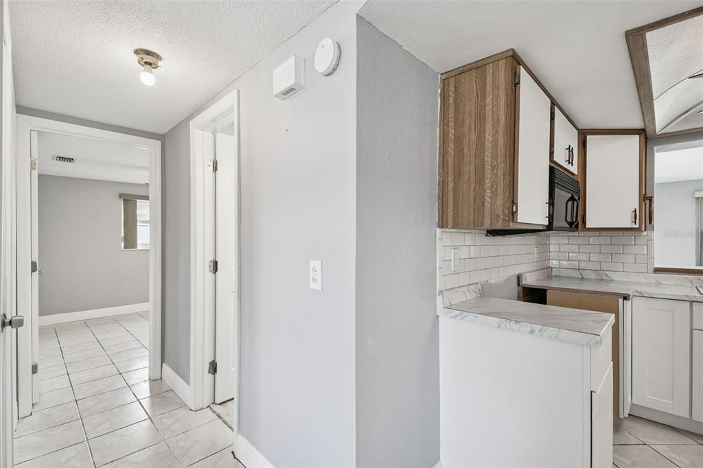 5410 Quist Drive Port Richey, FL 34668 - Photo 14 of 99 a bathroom with a sink and a mirror