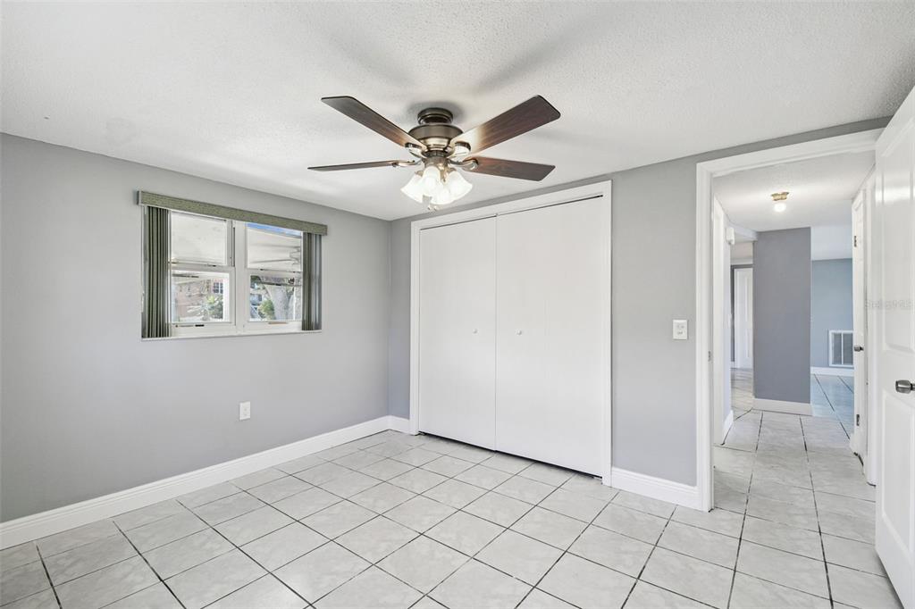 5410 Quist Drive Port Richey, FL 34668 - Photo 19 of 99 a view of an empty room with window