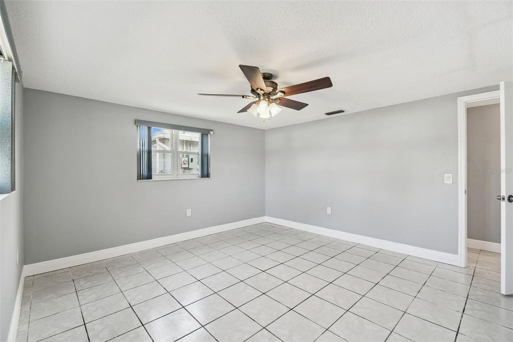 5410 Quist Drive Port Richey, FL 34668 - Photo 21 of 99 a view of an empty room