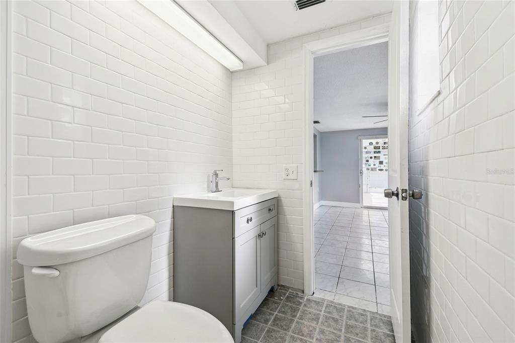 5410 Quist Drive Port Richey, FL 34668 - Photo 37 of 99 a bathroom with a toilet sink and shower