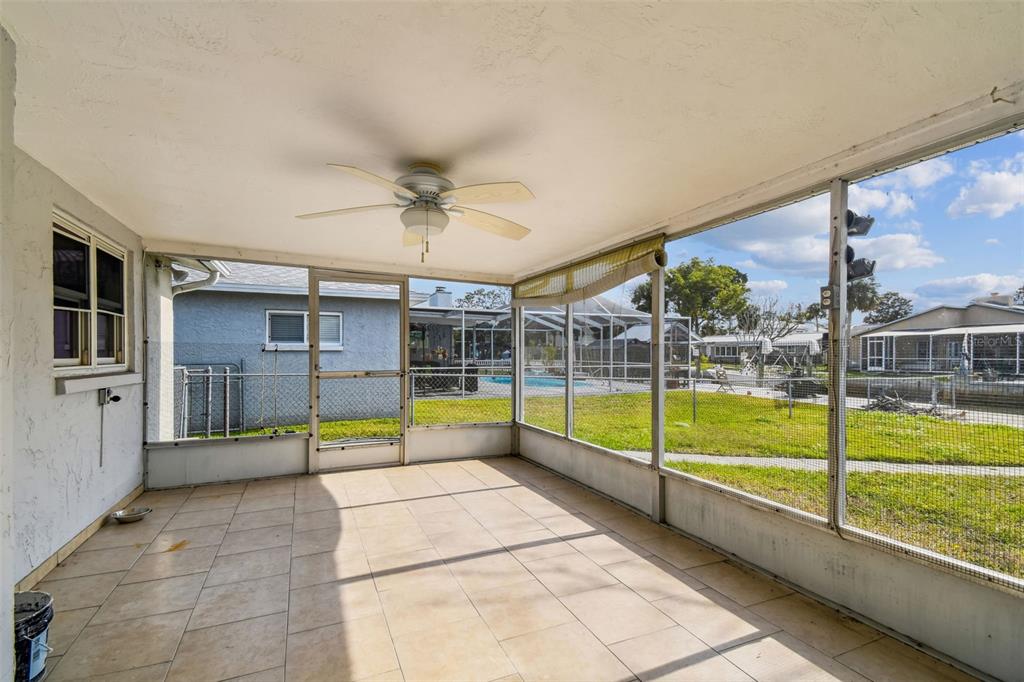 5410 Quist Drive Port Richey, FL 34668 - Photo 38 of 99 a view of an empty room with a large window