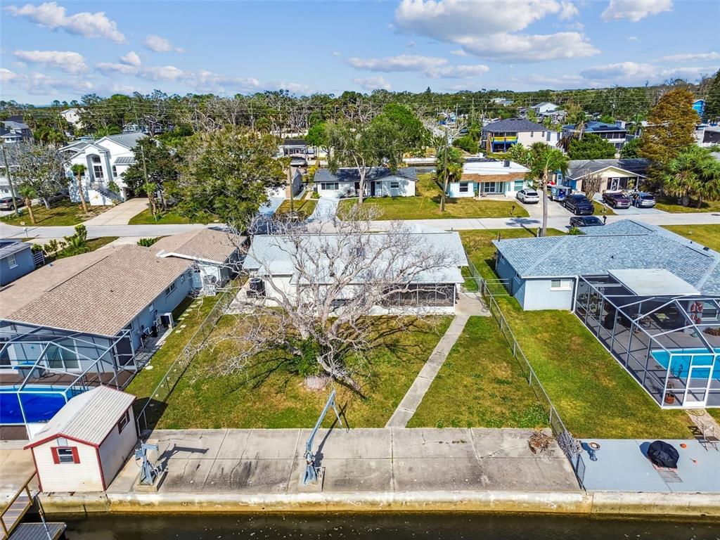5410 Quist Drive Port Richey, FL 34668 - Photo 68 of 99 an aerial view of residential houses with outdoor space