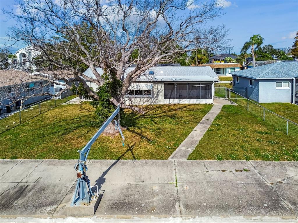5410 Quist Drive Port Richey, FL 34668 - Photo 70 of 99 a view of house with outdoor space and seating area