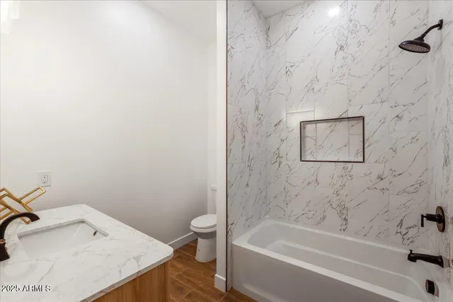 a bathroom with a sink and a bathtub