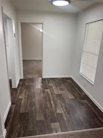 a kitchen with a stove a sink and a refrigerator