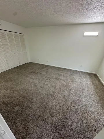 a bathroom with a sink toilet and mirror
